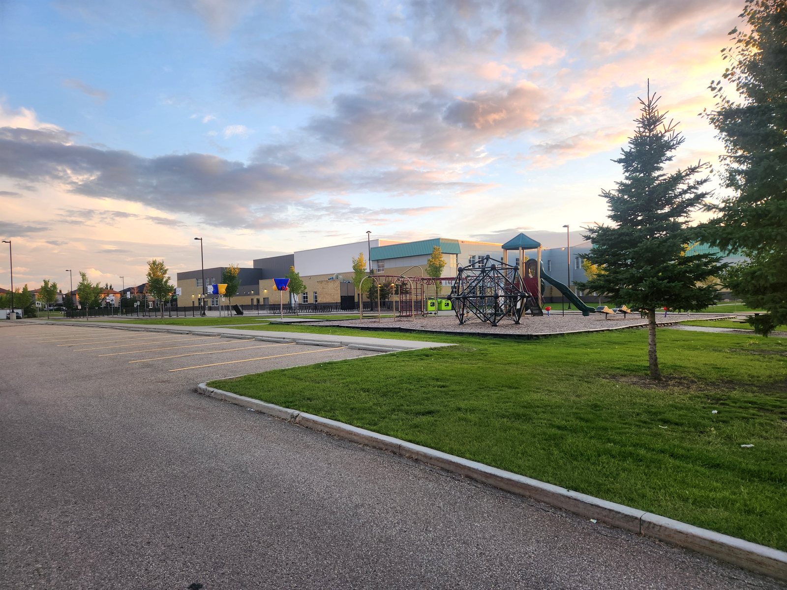 École Dansereau Meadows School and playground at sunset in Beaumont